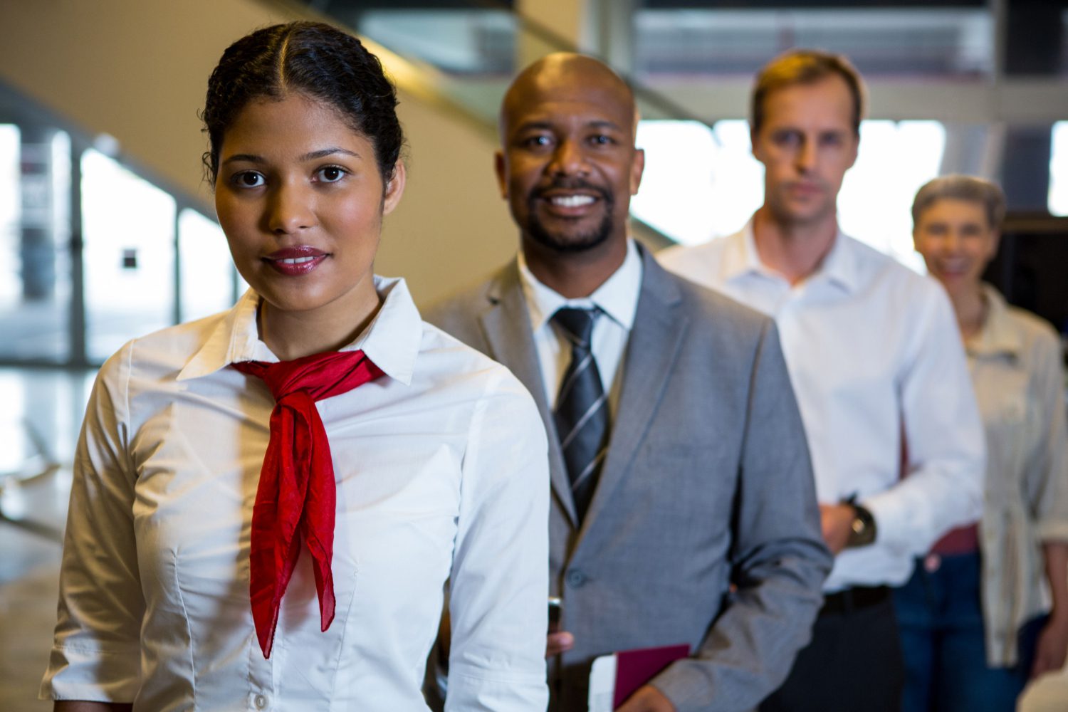 Airline crew lined up at airport